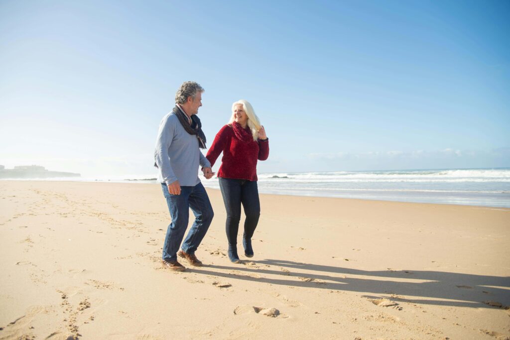 Expat couple at the beach Spain's Golden Visa